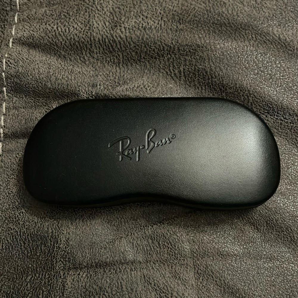 Ray-Ban glasses case. Brand new with lenses cloth. Never opened or used.